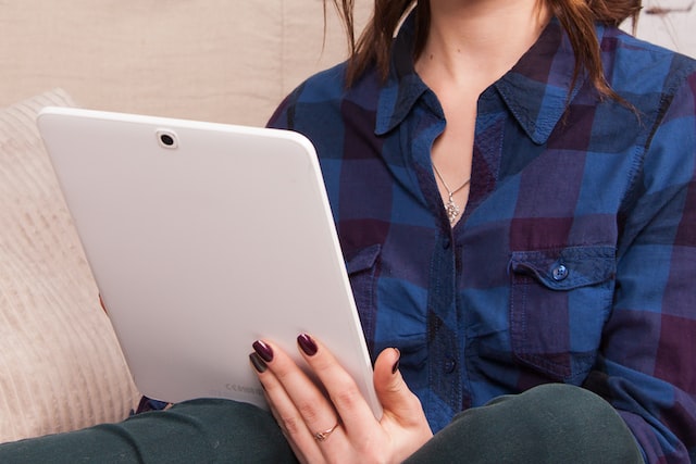 Attorney on tablet using a secure client portal for lawyers 
