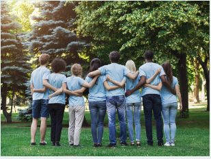 a group of nonprofit employees hugging