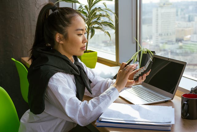 Business women working in office on SOX in Accounting