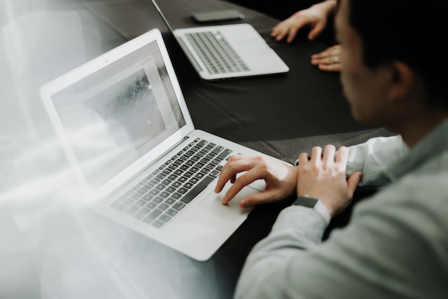 man working on his laptop using a cloud accounting software