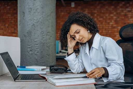 woman at a desk getting ready for tax preparation