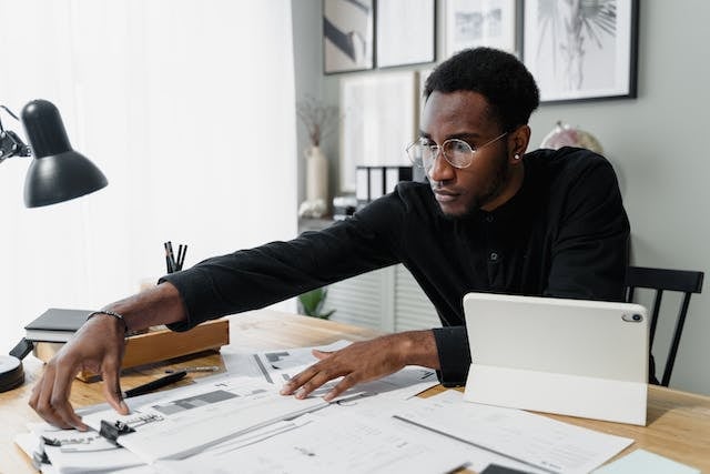 business owner working on how to do payroll